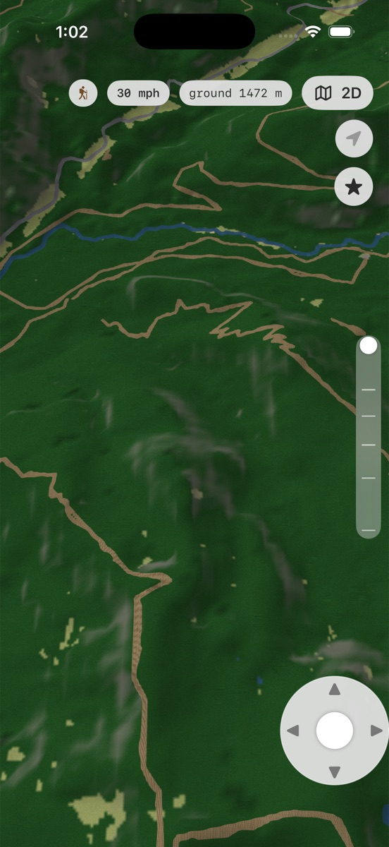 Low 3D flight over forested ridges with trails